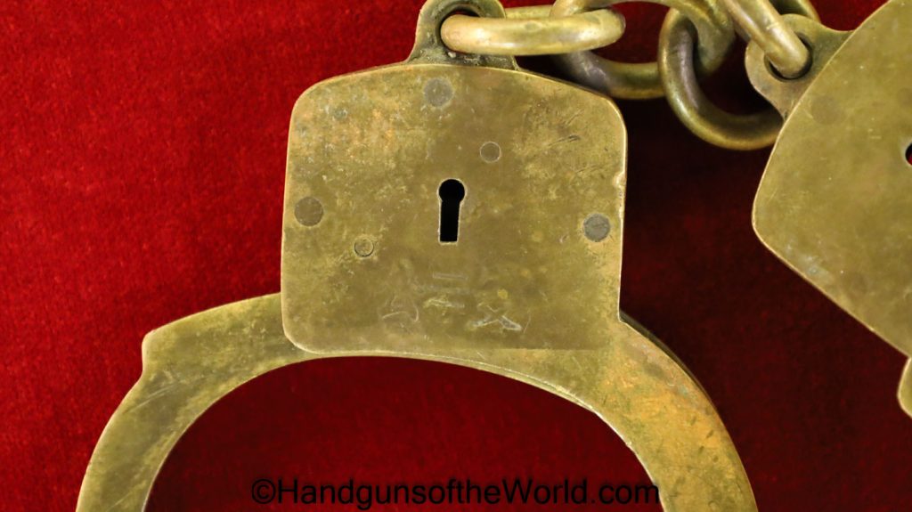 Chinese HandcuffsFull Brass Handguns of the World